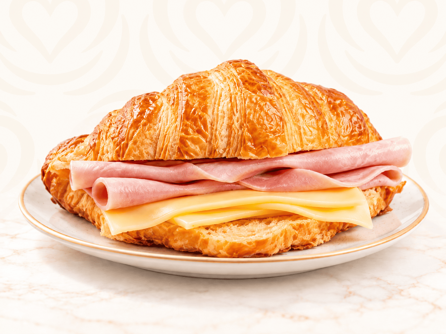 Sándwich de croissant con jamón y queso Fridolin